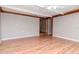 Inviting living room featuring hardwood floors and neutral wall color at 211 W Valencia St, Lakeland, FL 33805