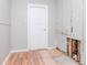 Utility room awaiting finishing touches, equipped with connections for essential appliances at 211 W Valencia St, Lakeland, FL 33805