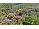 Secluded home surrounded by lush greenery, offering privacy and a connection with nature at 7641 Sw 185Th Cir, Dunnellon, FL 34432