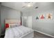 Bedroom with a large window and closet at 7641 Sw 185Th Cir, Dunnellon, FL 34432