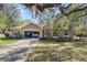 Charming single-story home with a two-car garage and well-maintained landscaping at 7641 Sw 185Th Cir, Dunnellon, FL 34432