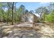 View of the detached garage with concrete pad at 7641 Sw 185Th Cir, Dunnellon, FL 34432