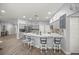 Bright kitchen with an island, stainless steel appliances, neutral cabinets, and ample counter space at 7641 Sw 185Th Cir, Dunnellon, FL 34432