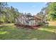 Enjoy this pool in the screened lanai surrounded by well-maintained landscaping at 7641 Sw 185Th Cir, Dunnellon, FL 34432