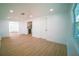 Spacious living room with recessed lighting, neutral walls, and modern wood flooring at 1401 Josephine St, Lakeland, FL 33815