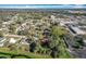 Aerial view of the neighborhood highlighting the lush greenery and tranquil community setting at 305 Bearcreek Dr, Bartow, FL 33830