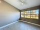 Bright bedroom with a large window providing ample natural light at 305 Bearcreek Dr, Bartow, FL 33830