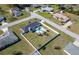 High aerial shot of home showing the fenced in yard with pool in a residential neighborhood at 17 Se 61St Ct, Ocala, FL 34472