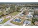 Wide aerial shot showing the location of the home, pool, and fenced yard within neighborhood at 17 Se 61St Ct, Ocala, FL 34472