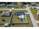 Overhead shot of home and backyard with private pool in fenced yard on a sunny day at 17 Se 61St Ct, Ocala, FL 34472