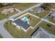 Aerial view highlighting property with fenced backyard, in-ground pool, and lush greenery at 17 Se 61St Ct, Ocala, FL 34472