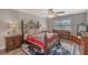 Bedroom featuring an ornate bed frame, ceiling fan and dresser at 17 Se 61St Ct, Ocala, FL 34472