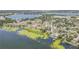 Aerial view of community near lake, beautiful lily pads, and stunning waterfront properties at 2500 21St Nw St # 88, Winter Haven, FL 33881