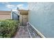 Charming townhouse entrance with brick walkway and decorative wreath at 2500 21St Nw St # 88, Winter Haven, FL 33881