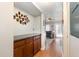 Hallway with built in cabinets leading into the living room at 2500 21St Nw St # 88, Winter Haven, FL 33881