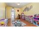 Spacious living room features hardwood floors and neutral walls at 2500 21St Nw St # 88, Winter Haven, FL 33881