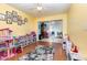 Brightly colored living room with views into the dining room at 2500 21St Nw St # 88, Winter Haven, FL 33881