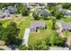 Aerial view of a home showcasing its expansive lawn and neighborhood setting at 2569 Rogers Rd, Lakeland, FL 33812