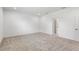 Spacious bedroom with carpet flooring and ample natural light at 2569 Rogers Rd, Lakeland, FL 33812