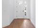 Entryway featuring a stylish front door with a sidelight and hardwood-style tile at 2569 Rogers Rd, Lakeland, FL 33812