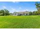 Single-story home showcasing a spacious front yard at 2569 Rogers Rd, Lakeland, FL 33812