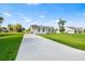 Charming single-story home featuring a well-manicured lawn and a long driveway at 2569 Rogers Rd, Lakeland, FL 33812