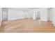 Bright and airy living room features neutral walls and tile floors at 2569 Rogers Rd, Lakeland, FL 33812