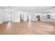Spacious living room with light-colored tile floors and ample natural light at 2569 Rogers Rd, Lakeland, FL 33812