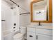 Updated bathroom featuring a tub, shower, white cabinets, and bronze fixtures at 5618 Winterbrook Way, Winter Park, FL 32792