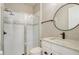 Bathroom features a glass-enclosed shower and modern vanity with marble countertop at 5618 Winterbrook Way, Winter Park, FL 32792