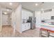Clean, open kitchen with white cabinets and subway tile backsplashes, stainless steel appliances at 5618 Winterbrook Way, Winter Park, FL 32792