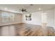 Open concept living room featuring an electric fireplace and bright decor at 5618 Winterbrook Way, Winter Park, FL 32792