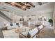 Bright living space featuring a fireplace, dining area and kitchen with a white sofa set at 5618 Winterbrook Way, Winter Park, FL 32792