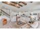 Spacious living area with open floor plan, beamed ceiling, and stylish decor at 5618 Winterbrook Way, Winter Park, FL 32792