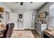 Spacious office area with decorative rug, ceiling fan, and a variety of decorative items on display at 5618 Winterbrook Way, Winter Park, FL 32792