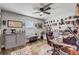 Office space with built-in storage, decorative art, and large windows for natural light at 5618 Winterbrook Way, Winter Park, FL 32792