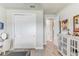 Home office space features a closet, neutral walls, natural light, and doorway to other rooms at 5618 Winterbrook Way, Winter Park, FL 32792