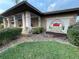 Elegant clubhouse entrance with stone accents and the Monarch golf club signage at 21505 Castle View Ct, Leesburg, FL 34748