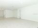 Spacious living room with tile flooring and plenty of natural light at 2450 Slippery Rock St, Auburndale, FL 33823