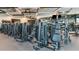 Well-equipped fitness center with modern weightlifting equipment and mirrored walls at 2611 Skyline Loop, Kissimmee, FL 34758