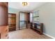 Walk-in closet with installed shelves and cabinetry for storage and organization at 2730 Woodland Hills Ave, Lakeland, FL 33803