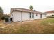 Image of the back of the home, showing siding and backyard at 2370 Sw 146Th Loop, Ocala, FL 34473