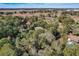 Expansive acreage featuring a charming home nestled among mature trees, offering privacy and a serene atmosphere at 5670 Sw 34Th St, Ocala, FL 34474