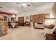 Combined living and dining area with tile flooring, a dining set, and access to outdoor space at 5670 Sw 34Th St, Ocala, FL 34474