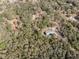 Aerial view of a property, including wooded area at 12308 Se 112Th Avenue Rd, Belleview, FL 34420