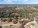 Aerial view showcasing expansive tree coverage and the surrounding area at 12308 Se 112Th Avenue Rd, Belleview, FL 34420