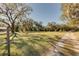 Beautiful homesite with mature trees, ample sunlight, and a charming country road leading to the property at 12308 Se 112Th Avenue Rd, Belleview, FL 34420