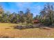 Wide open space and land ready for development with a picnic table and shed on the property at 12308 Se 112Th Avenue Rd, Belleview, FL 34420