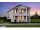 Charming two-story home with double porch, landscaped yard and neutral paint at 16198 Honey Harvest St, Winter Garden, FL 34787