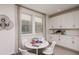 Bright flex room with white cabinets, seating and space for activities at 16198 Honey Harvest St, Winter Garden, FL 34787